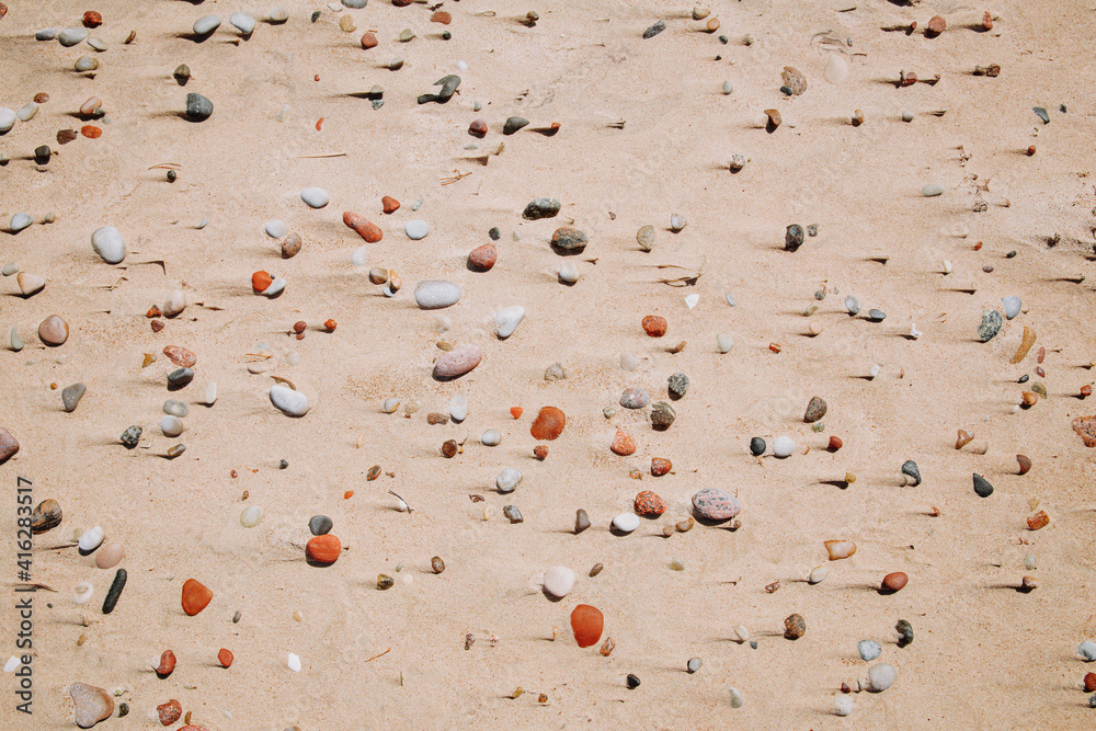 Colorful stones and pebbles on the beach. Abstract image. Colorful stones and pebbles on the beach. Abstract image.
