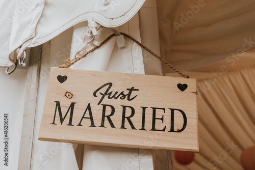 Just married sign at wedding reception.
