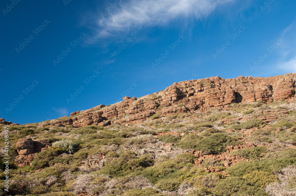 Cliff and cloud.