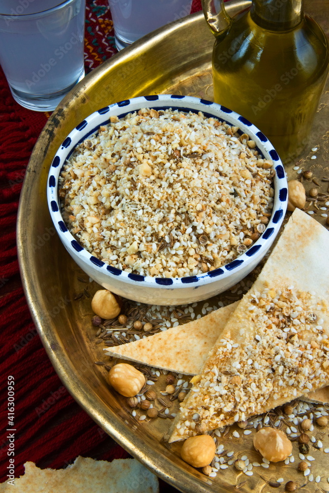 Dukkah (dokka), dry mixture of chopped nuts, seeds and arabic spices and flavors, Egypt Dukkah (dokka), dry mixture of chopped nuts, seeds and arabic spices and flavors, Egypt