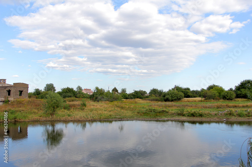 open spaces. Pole. River. Sky. The clouds. Summer Russian landscapes. Road views Summer landscape background