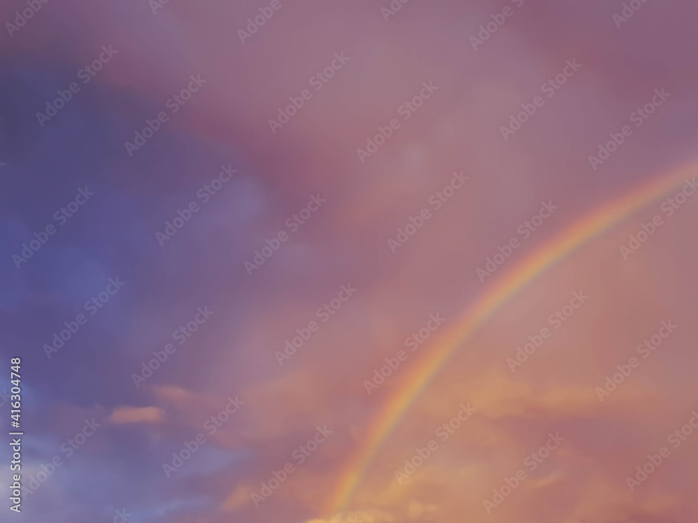 detail of rainbow rainbow in pink and violet sky colors detail of rainbow rainbow in pink and violet sky colors