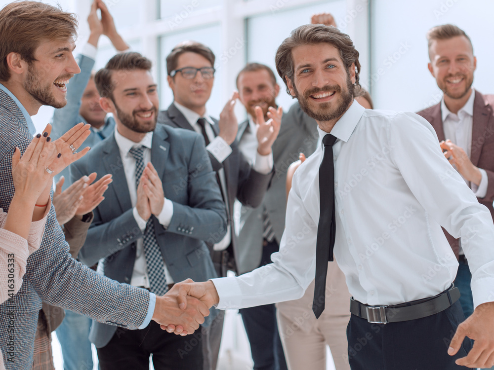 business team congratulating each other on the victory business team congratulating each other on the victory