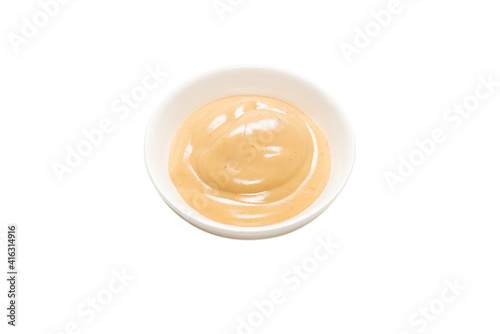 Mushroom sauce in a bowl isolated on white background.