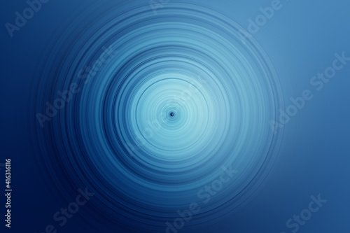 Abstract radial motion blur on blue background. Blue soft background, circular blur in the form of a whirl background texture, radial blur, abstract twist, funnelRound pattern for design.
