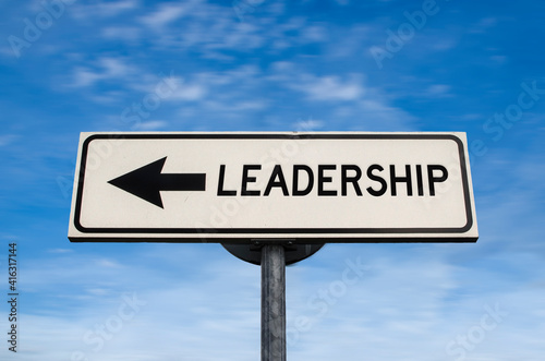 Leadership road sign, arrow on blue sky background. One way blank road sign with copy space. Arrow on a pole pointing in one direction.