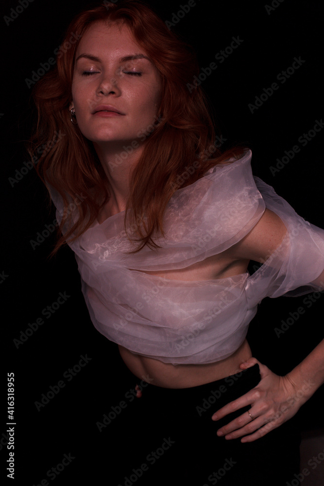 portrait of a ginger woman in white top portrait of a ginger woman in white top