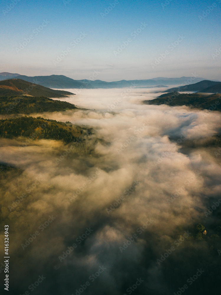 Fog in the mountains of the Carpathians, view from the drone