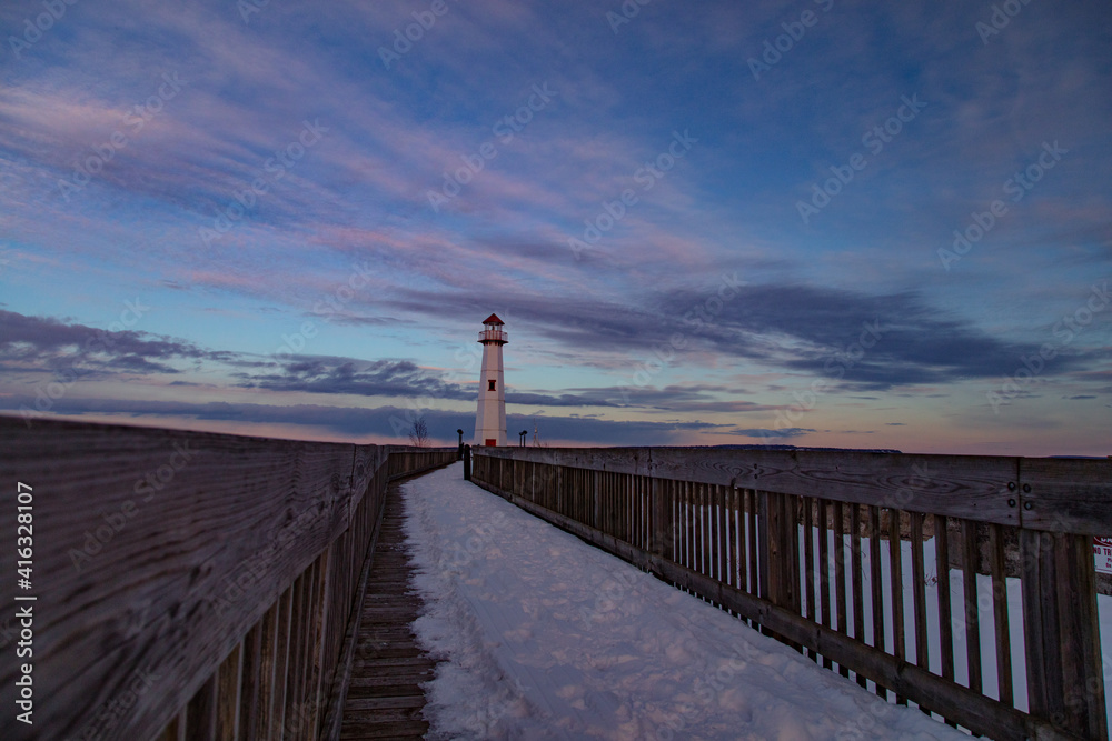 Wawatam lighthouse during winter in St. Ignace, Michigan.