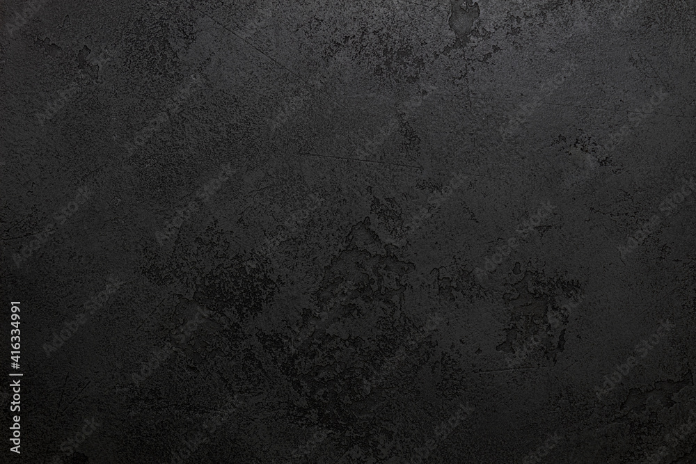 Designed dark stucco background (plastered wall texture). Designed dark stucco background (plastered wall texture).