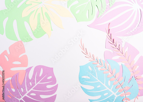 Paper tropical leaves, monstera, palm, white background. Space for text