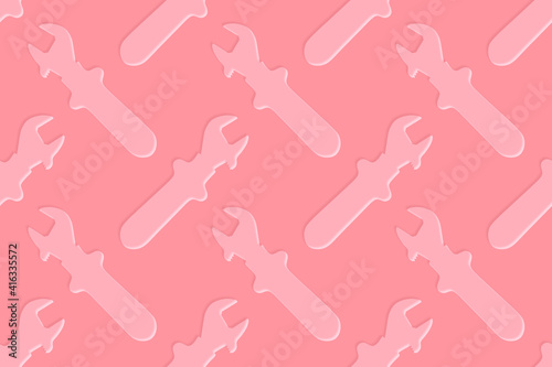 Adjustable wrench seamless pattern. Background from a metal adjustable wrench.