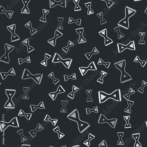 Grey Sauna hourglass icon isolated seamless pattern on black background. Sauna timer. Vector.