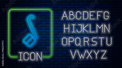 Glowing neon Sauna ladle icon isolated on brick wall background. Neon light alphabet. Vector.