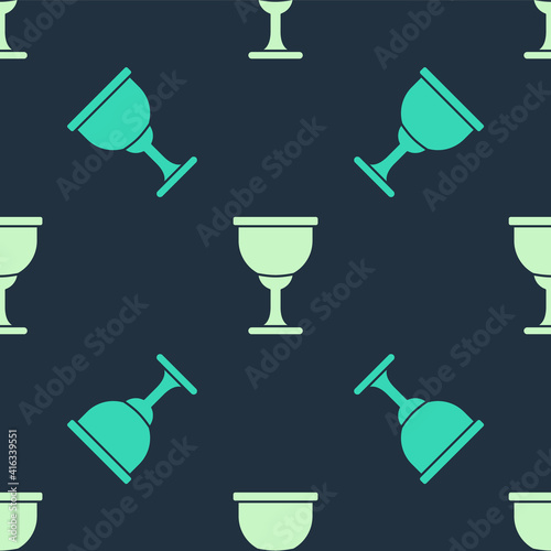 Green and beige Holy grail or chalice icon isolated seamless pattern on blue background. Christian chalice. Christianity icon. Vector.