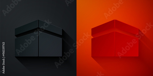 Paper cut Kaaba mosque icon isolated on black and red background. Kaaba hajj Mecca pray pilgrimage Ramadan Islam muslim mosque. Paper art style. Vector.