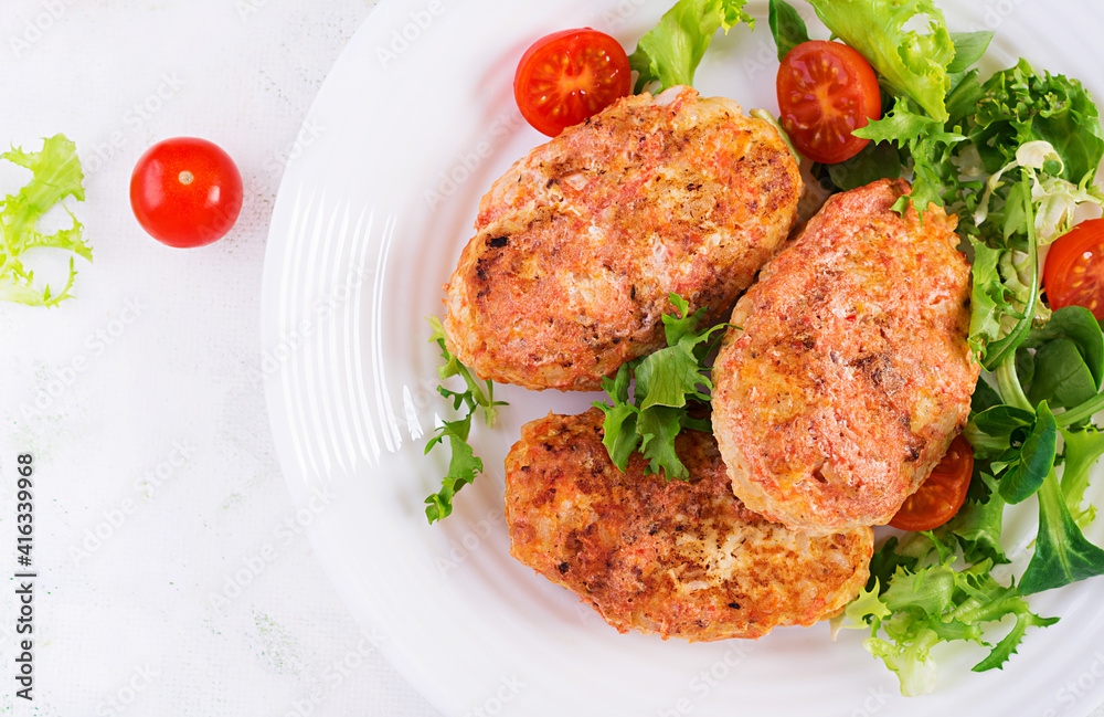 Meatballs with cabbage. Lazy cabbage rolls with fresh salad on light background. Russian cuisine. Top view, above, copy space