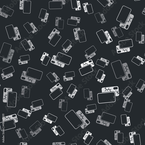 Grey Smartphone with broken screen icon isolated seamless pattern on black background. Shattered phone screen icon. Vector.