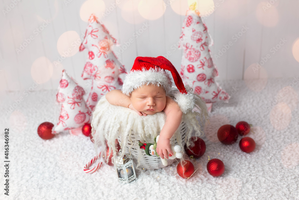first photo session. newborn child. child in in a New Year's image. first pictures of newborn new year first photo session. newborn child. child in in a New Year's image. first pictures of newborn new year