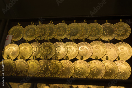 Plenty of geniune gold coins in view photo