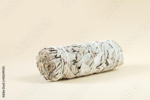 Bundle of dry white sage, product for purification, meditation or healing photo