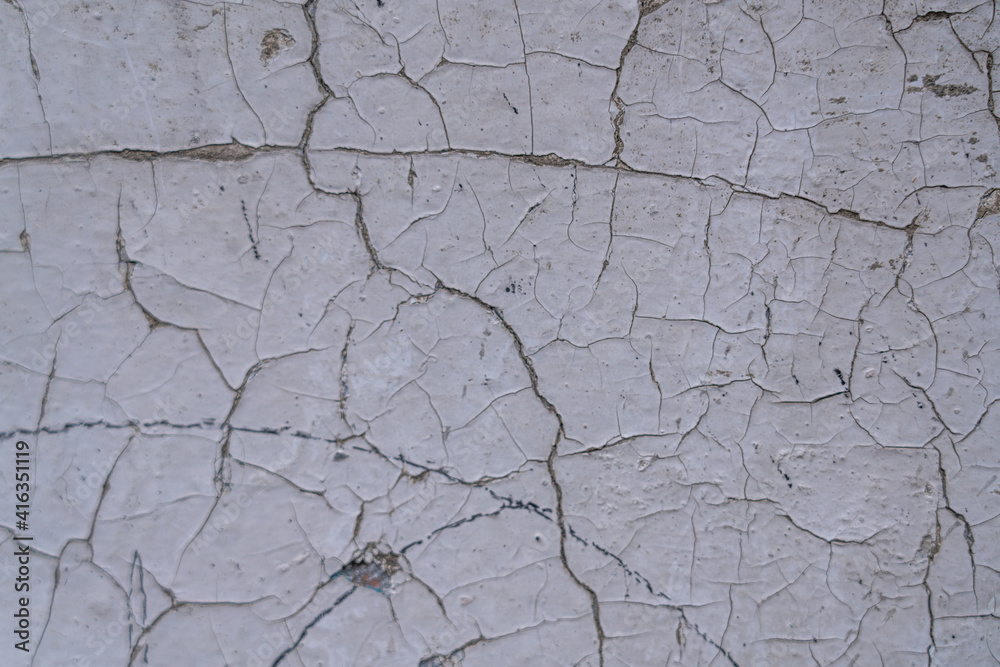 Obraz premium Abstract background white wall in cracks