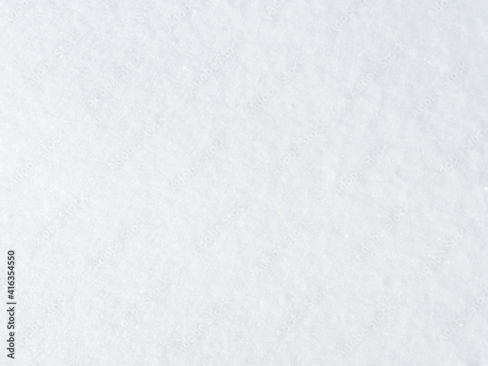 Obraz premium background of fresh snow texture in bright white, sparkling in the sun