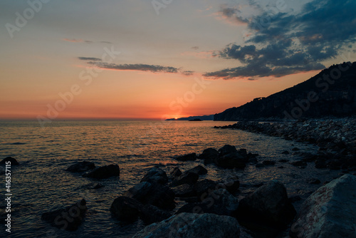 Beautiful orange sunset at the Adriatic sea in Montenegro 