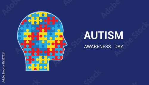 Autism awareness day. Head-shaped puzzles. Blue background.
