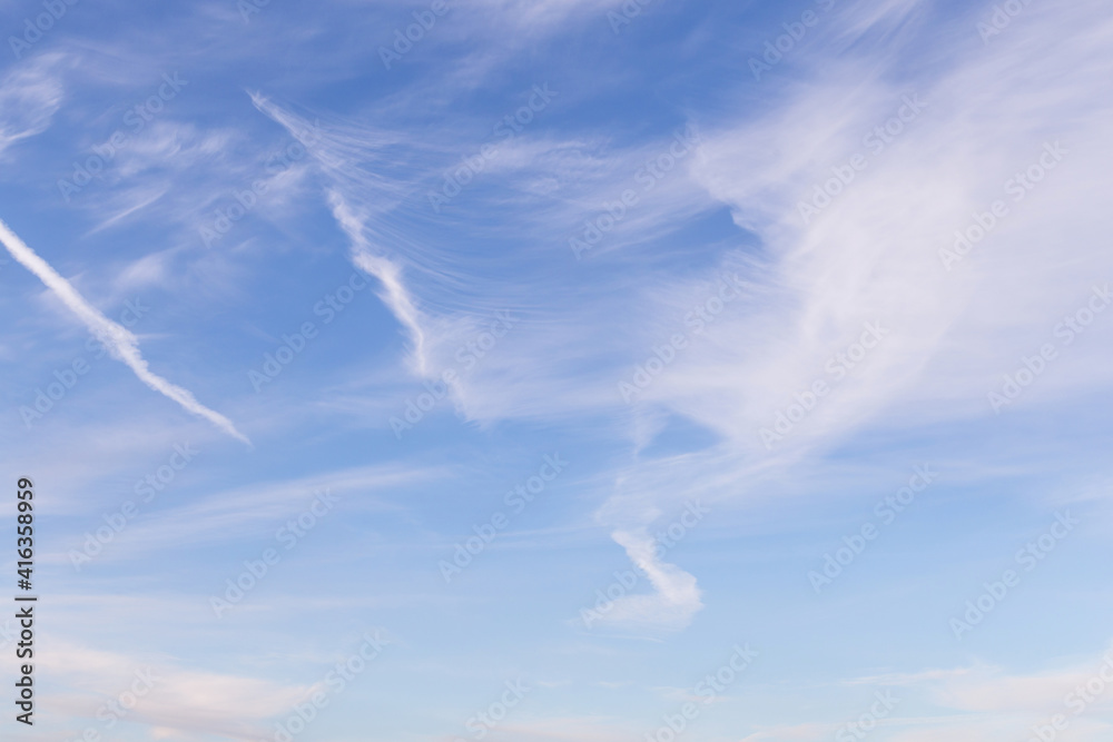 Abstract background texture. Blue sky with white cirrus clouds Abstract background texture. Blue sky with white cirrus clouds