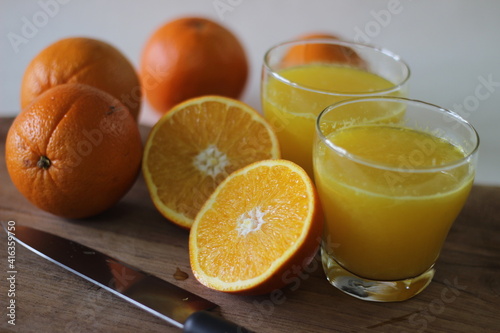 Glass of Kinnow Juice. It is juicier than orange and has more sour taste photo