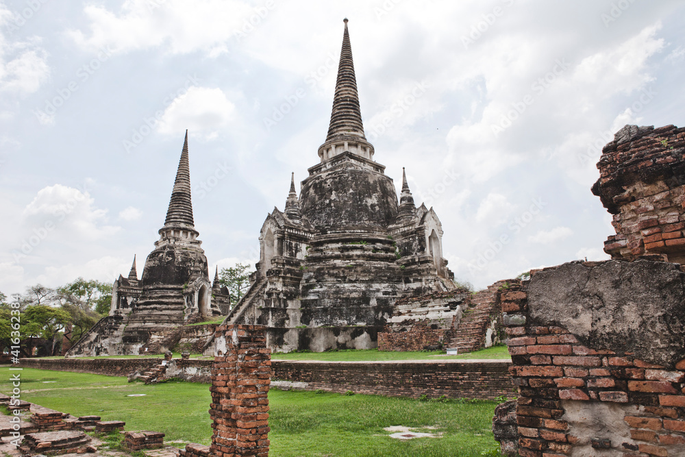 AYUTTHAYA, THAILAND - MAY 25, 2018: Ayutthaya Historical Park in Ayutthaya (second capital of the Siamese Kingdom). A very popular destination for day trips from Bangkok. Wat Phrasisanpetch Temple. 