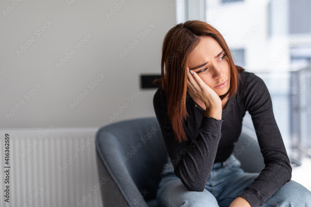 Obraz premium Depression woman sit on the chair at home
