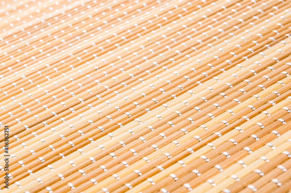 brown bamboo Mat - stand food, close-up, macro brown bamboo Mat - stand food, close-up, macro