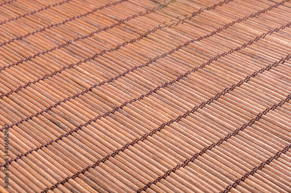 brown bamboo Mat - stand food, close-up, macro brown bamboo Mat - stand food, close-up, macro