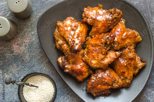 Baked chicken wings in honey and soy sauce glaze
