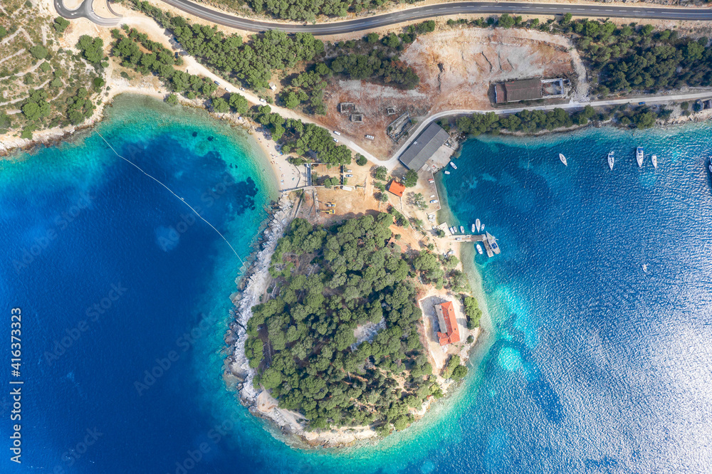 Aerial overhead drone shot of peninsula on Vis Island in Adriatic sea in Croatia summer