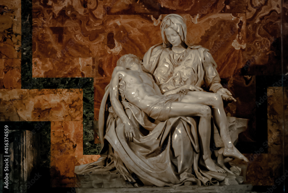statue of Jesus christ on Mary's arms