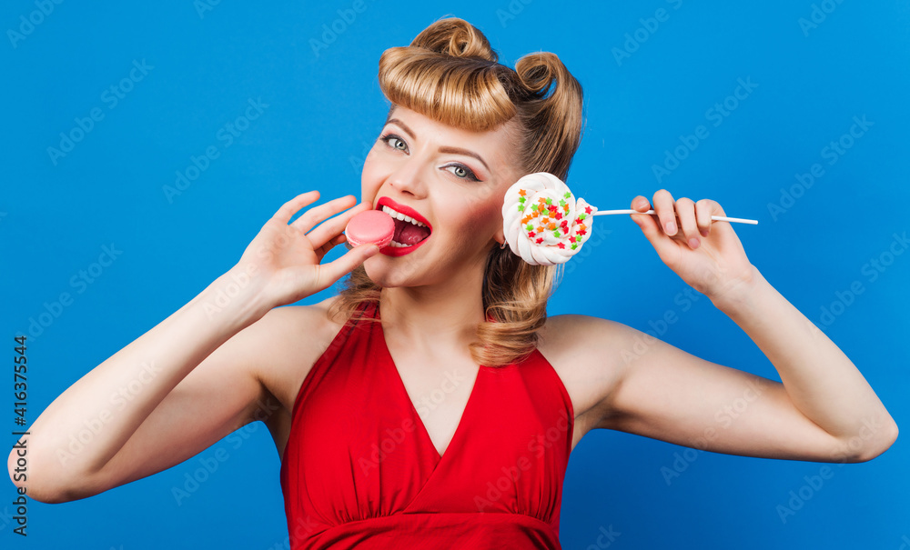 Happy girl with lollipop and macaroons. Smiling woman with candy and macarons. Sweet food. Sweetness. Dieting concept. Happy girl with lollipop and macaroons. Smiling woman with candy and macarons. Sweet food. Sweetness. Dieting concept.