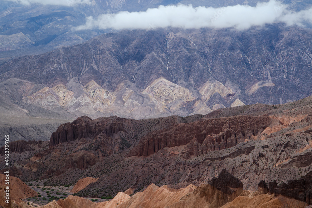Majestic landscape background. View of Humahuaca ravine in Jujuy, Argentina. The colorful Andes mountains, sandstone formations, cliffs and beautiful rock texture. 