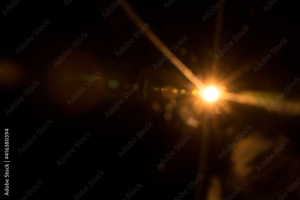 Fototapeta premium Abstract Natural Sun flare on the black