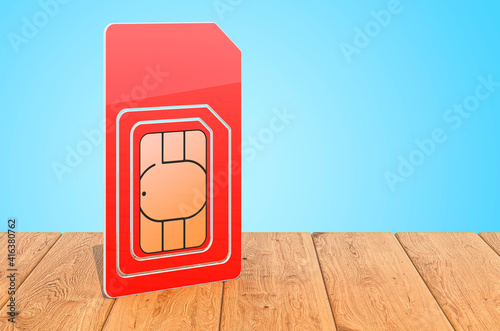 Sim Card on the wooden planks, 3D rendering photo