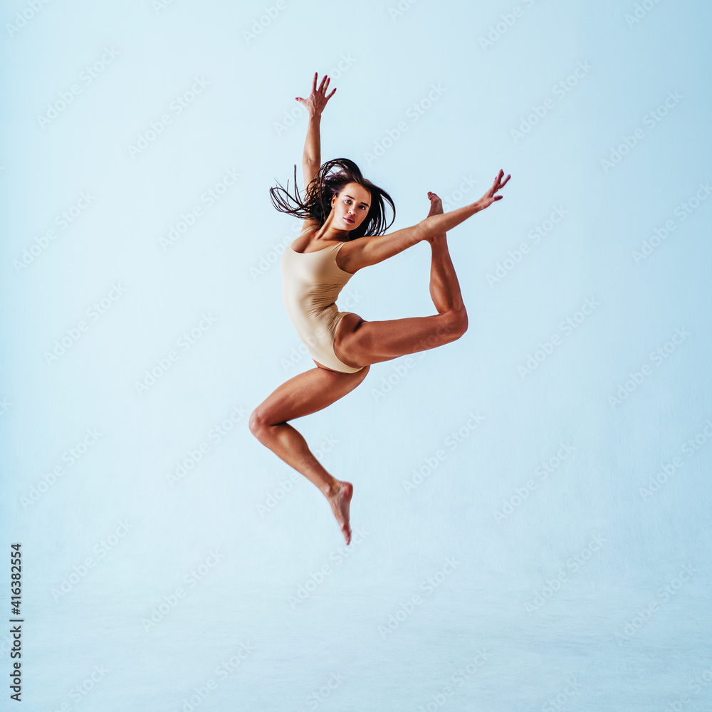 Fototapeta premium Woman gymnast jumping