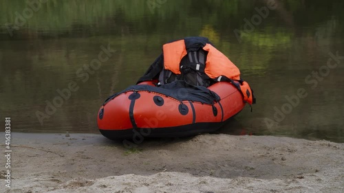 Packcraft on the banks of the Khoper River, which is temporarily abandoned in search of a parking lot. photo