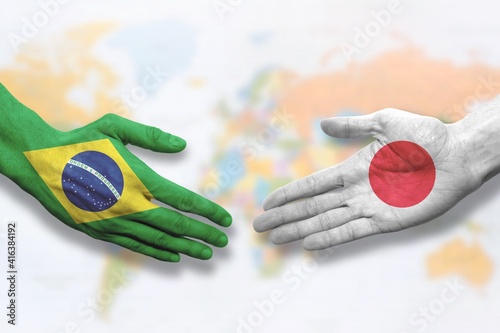 Brazil and Japan - Flag handshake symbolizing partnership and cooperation