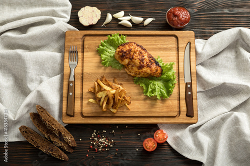 sliced chicken breast on wooden cutting board