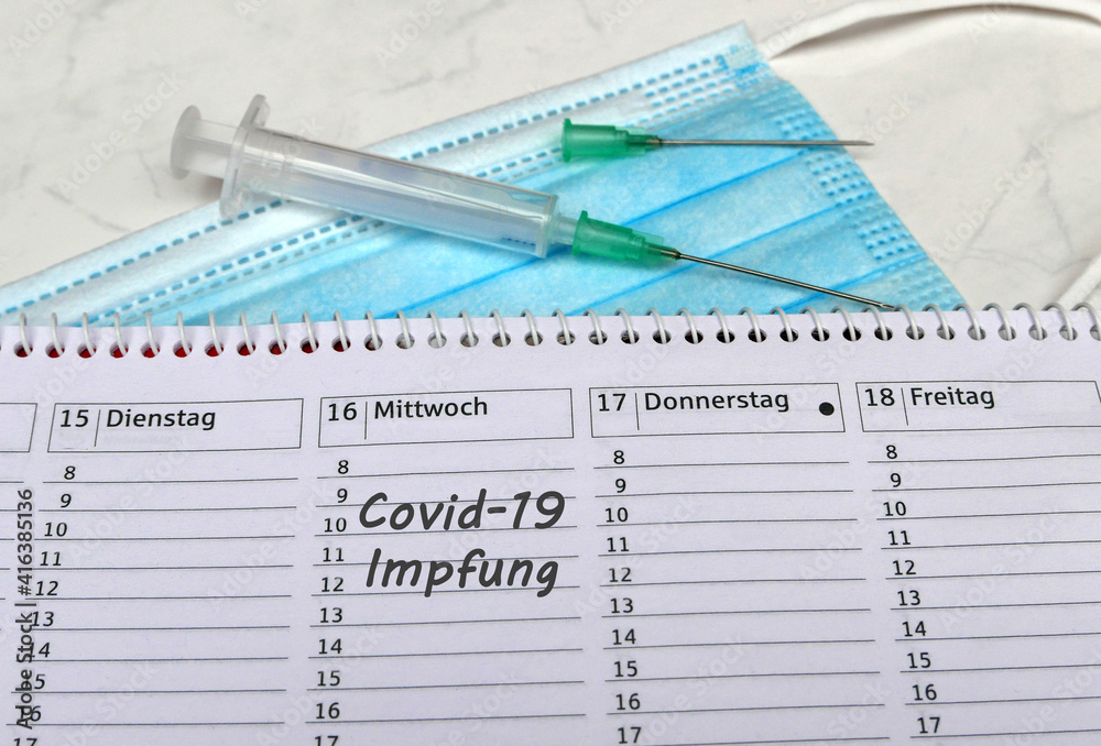 Kalender mit Vermerk Covid-19 Impfung Stock Photo  Adobe Stock