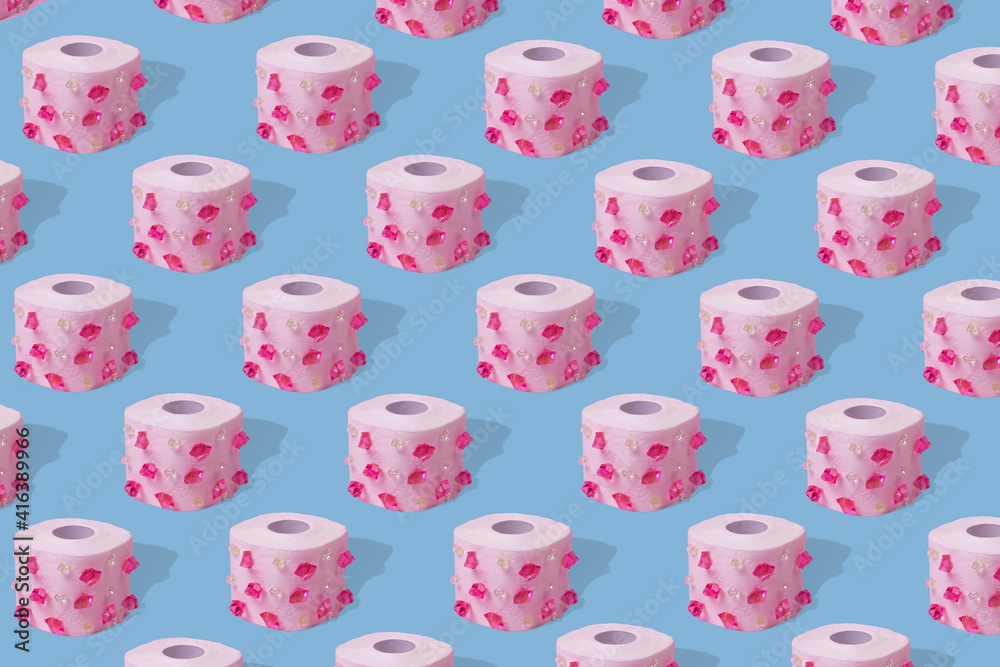 Creative idea made of toilet paper with diamonds, pattern on a bright  blue background.