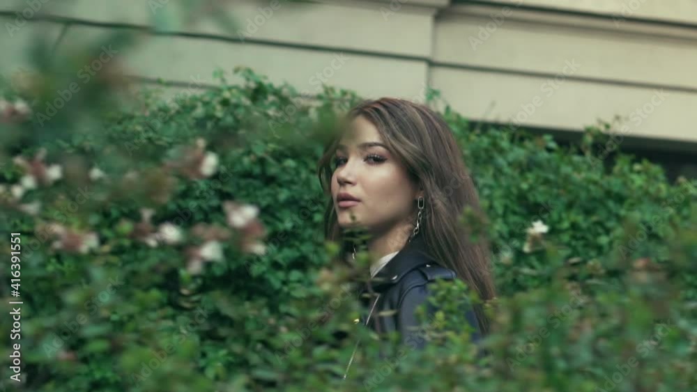 Beautiful Young Woman Walking Through Alley Beautiful Young Woman Walking Through Alley