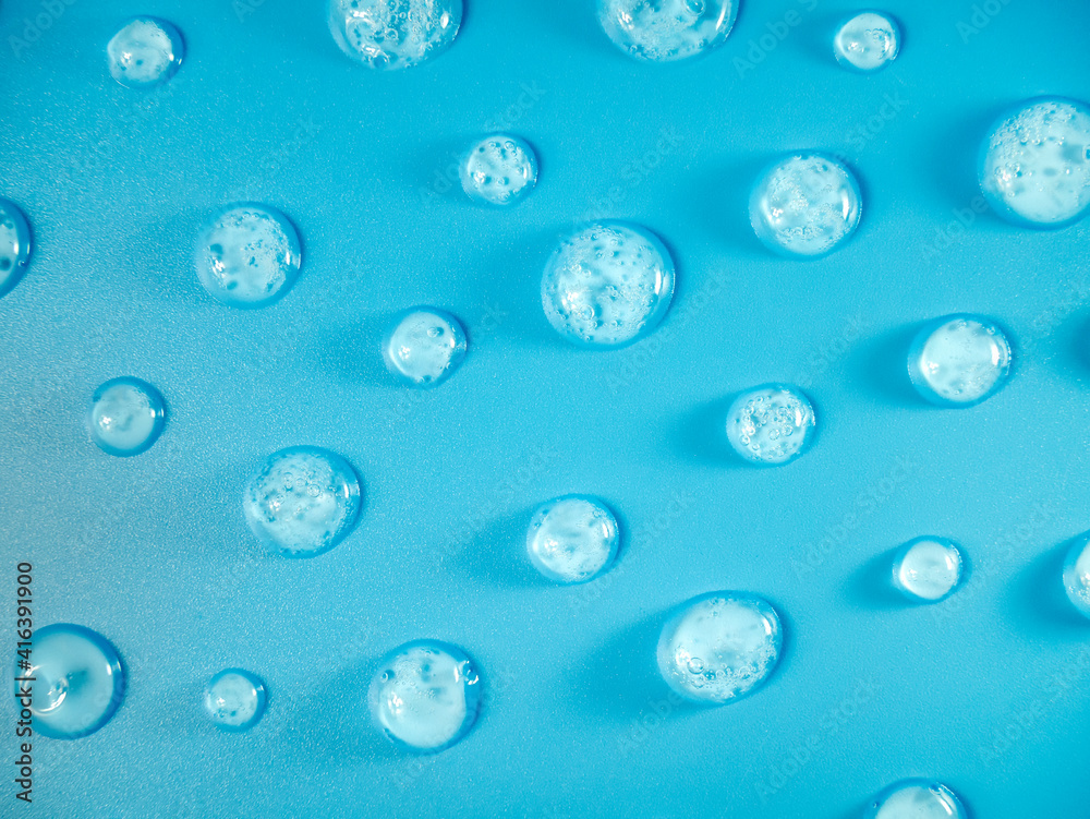 Abstract background cosmetic product, water drops with air bubbles, cream gel with oxygen bubbles for skin care